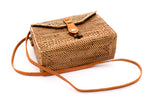 Roomy natural rattan handbag, rectangular shape, hand woven in Bali Indonesia with leather strap & brass clasp.