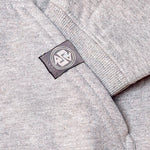 Heavyweight gray hoodie hand printed in Philippines with Philippines Jeepney motif printed on back showing detail of cuff, pocket & logo.